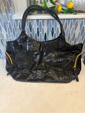 🦋 Mariah Carey Black Patent Shoulder Bag with Gold Zipper Accents